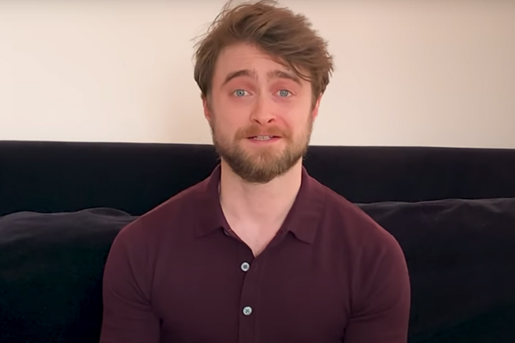 Daniel Radcliffe is reading Harry Potter and the Philosopher’s Stone
