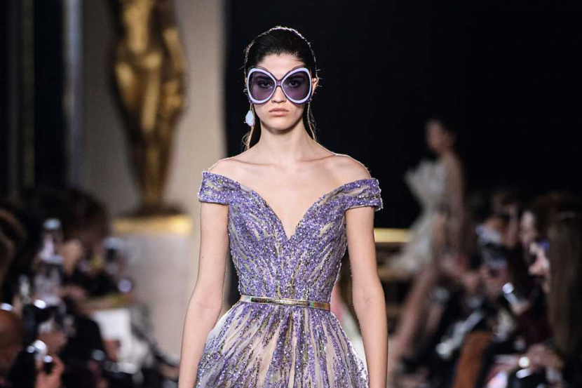 The History Of High End Fashion Is Being Showcased At Louvre Abu Dhabi Art Time Out Abu Dhabi Gucci is a designer fashion label, that produces fashion items, mostly including high end leather goods and clothing. being showcased at louvre abu dhabi